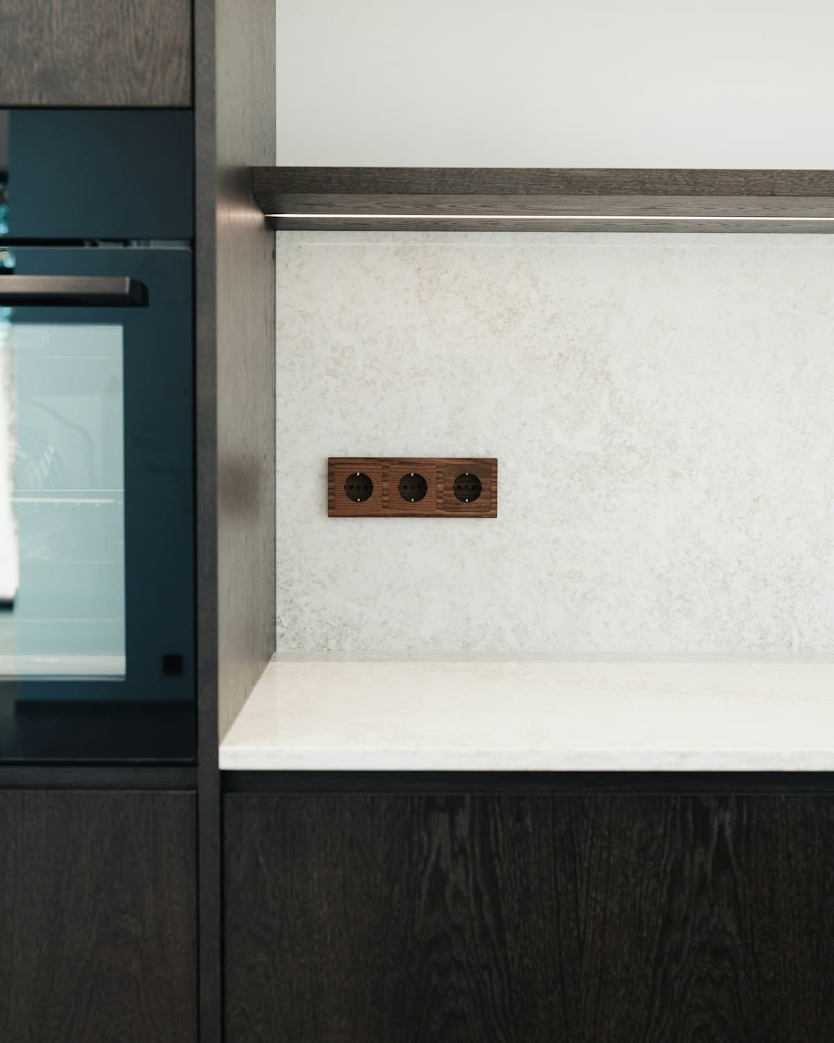 Dark cabinetry in a home kitchen