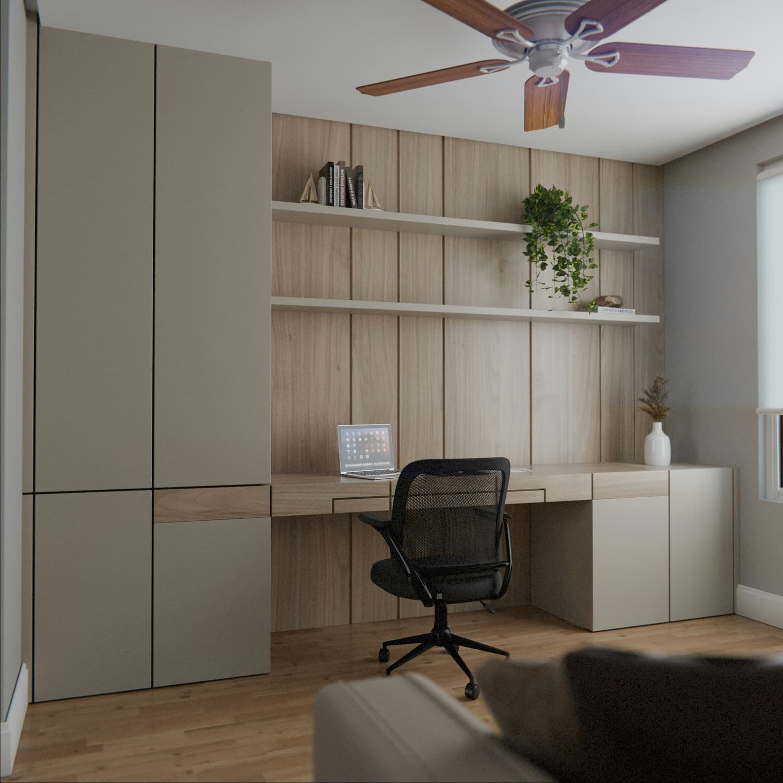 Home office with a built-in desk and wall cabinetry