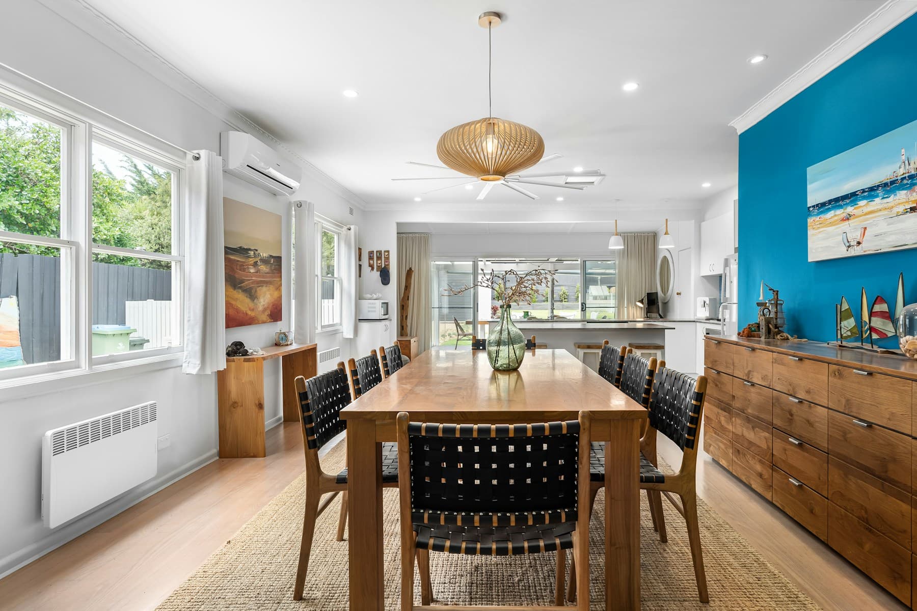 Dining room with a wood table and sideboard